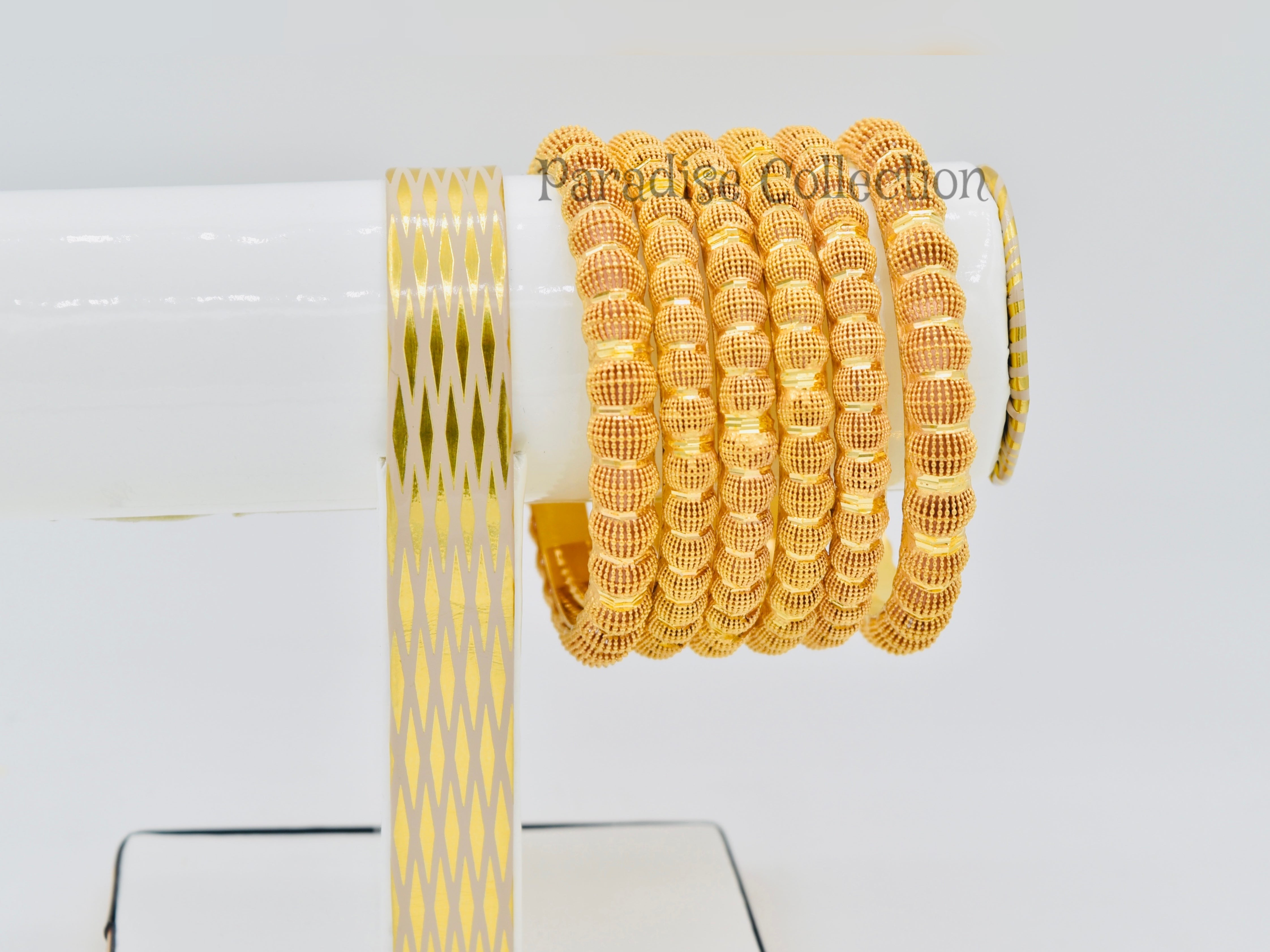 ELEVATE YOUR STYLE WITH EVERY SPARKLE Buy The Pack Of 6 Bangles with a FREE Jewelry Box – A Set That Defines Luxury ✨