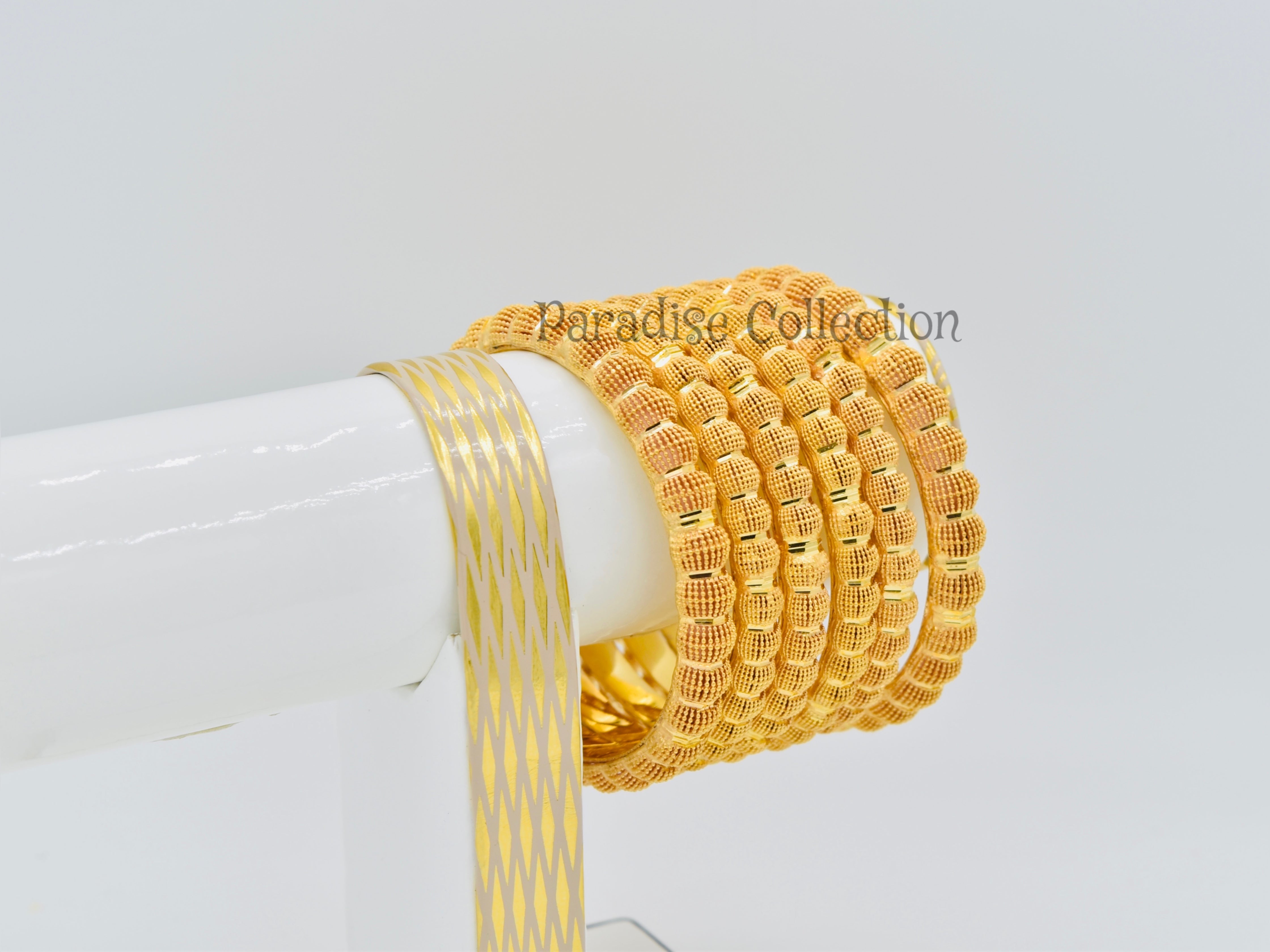 ELEVATE YOUR STYLE WITH EVERY SPARKLE Buy The Pack Of 6 Bangles with a FREE Jewelry Box – A Set That Defines Luxury ✨